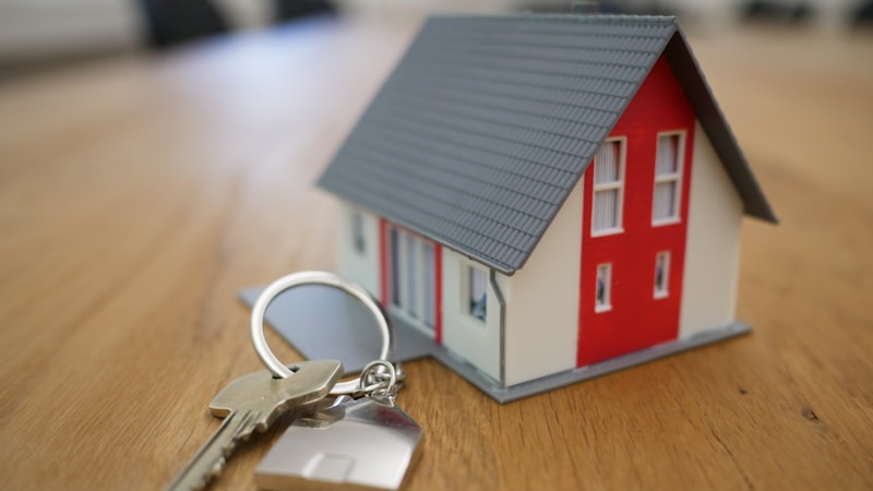 House keys being handed over, representing rent paid and the HRA tax exemption